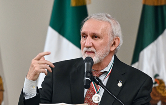Sergio Aguilar-Gaxiola speaks at a podium
